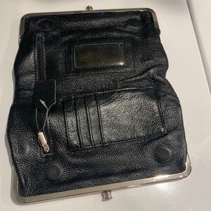 EUC Genuine black leather clutch! Maybe used once? Opens up fully